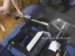 Blonde beauty with small tits takes off her clothes and produces testing fucking machines masturbating